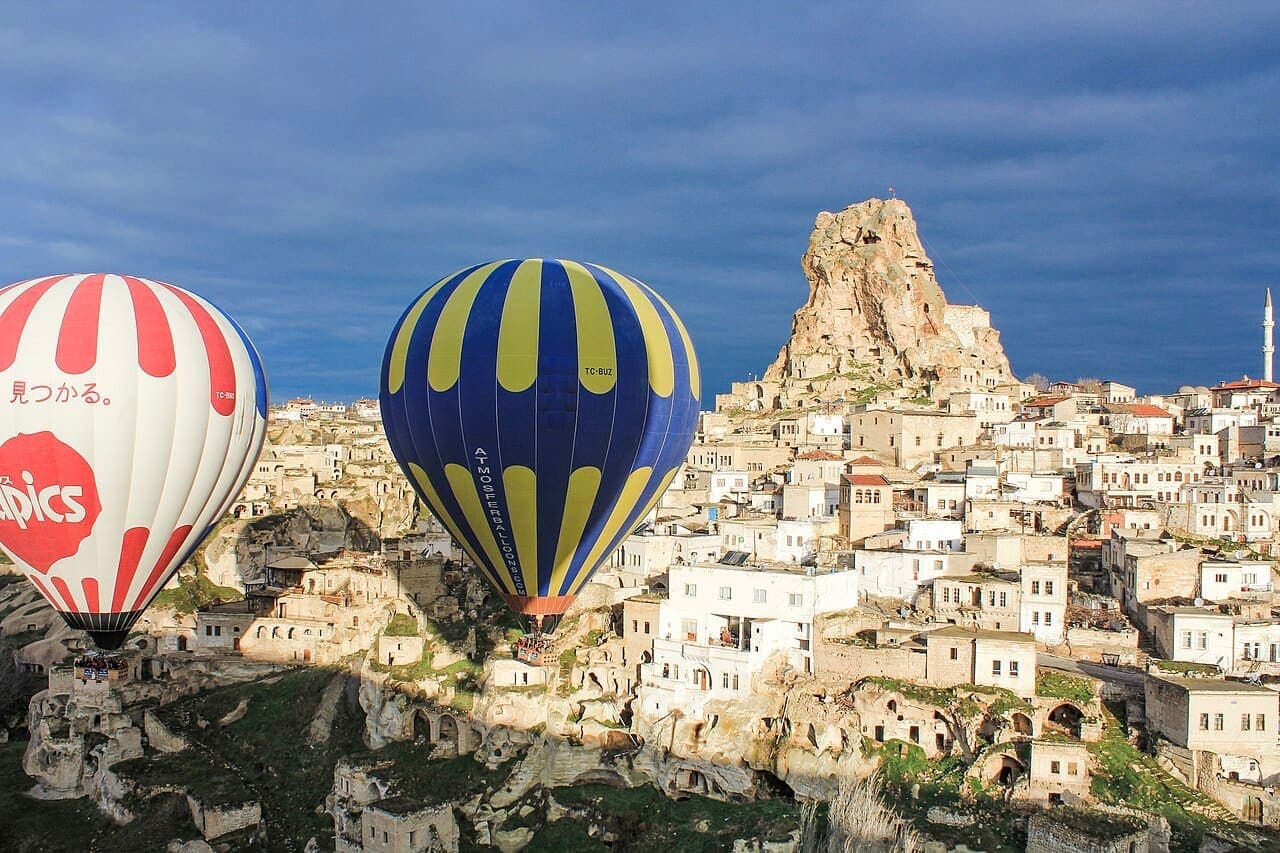 Hot air balloons over fairy chimneys in Cappadocia